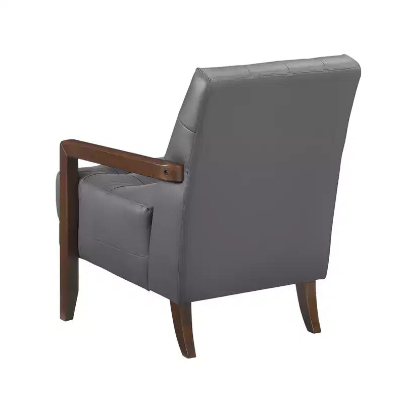 Comoda poltrona d'accento in pelle, contemporanea per il soggiorno, con cuscino imbottito trapuntato e braccioli in legno color noce